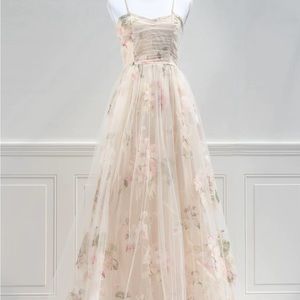 Amantine NWT cream floral fairy dress. Size medium. Never worn.